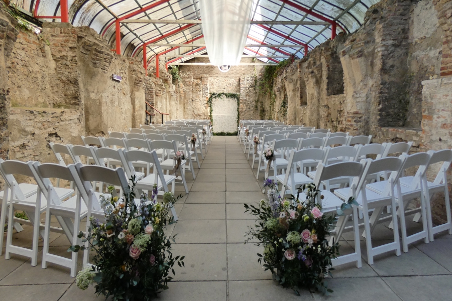 Beckets Chapel White Chairs laid out for wedding